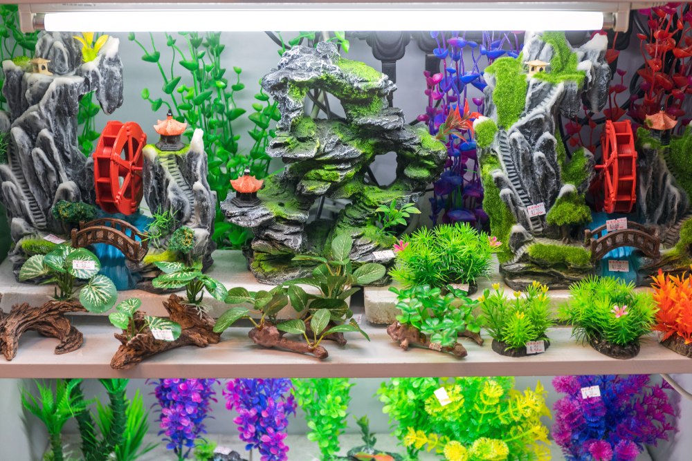 Underwater stones, fake plants, and decorations for a fish tank.
